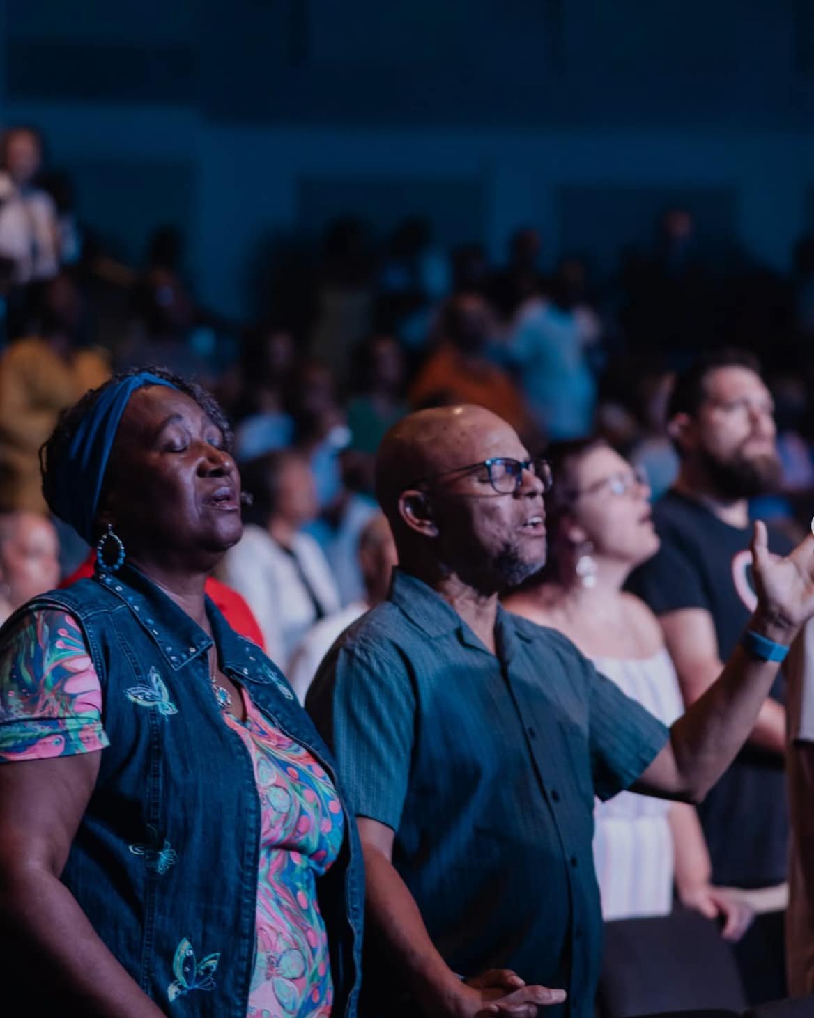 Members of the Mountain West congregation in worship